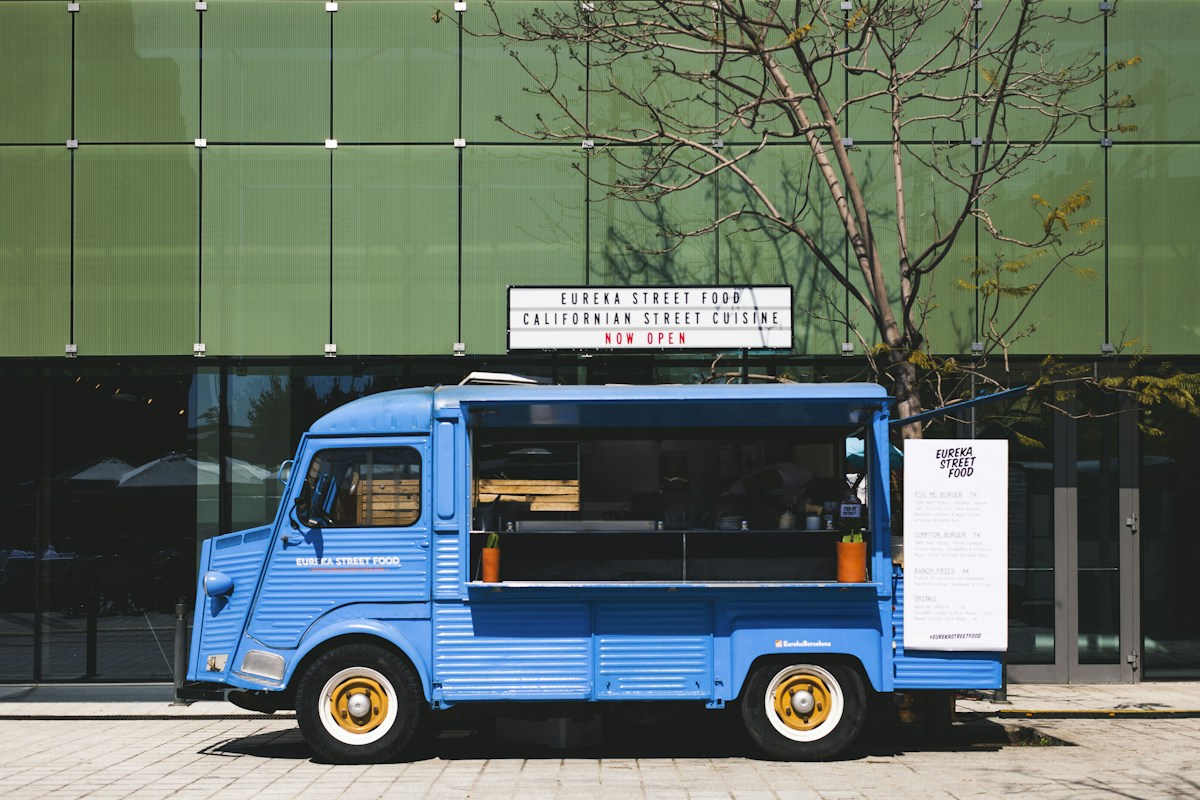 Food truck vendor serving customers